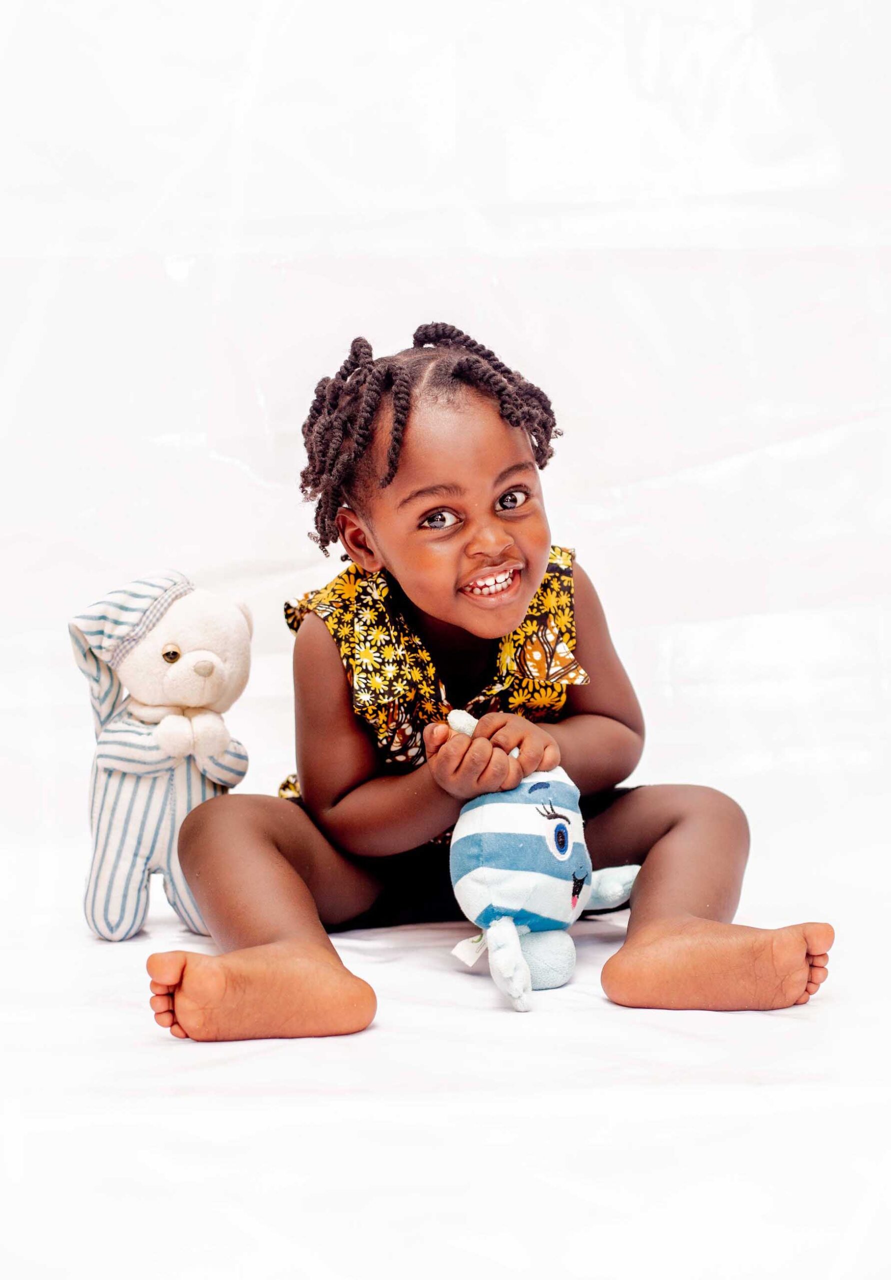 Little child playing with toys